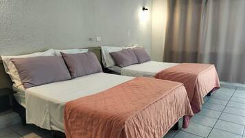 Premium bedding, down comforters, free WiFi, bed sheets