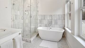 Combined shower/tub, hair dryer, towels, soap
