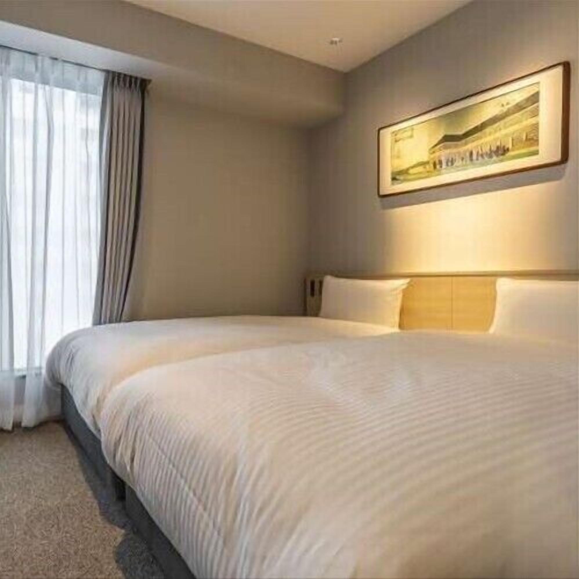 Down comforters, desk, blackout drapes, iron/ironing board (on request)