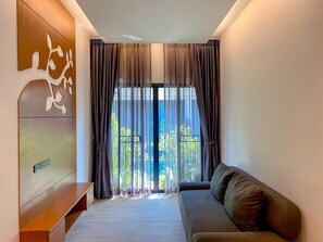 Vila, 2 quartos | Área de estar | TV de tela plana 40 polegadas com canais a cabo, TV