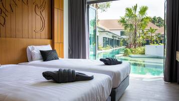 Premier 2 Bedroom Pool Access | In-room safe, desk, laptop workspace, free WiFi