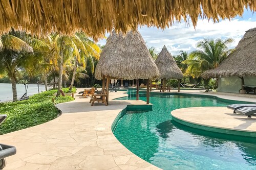 Villa and casita in a secluded development with WiFi, AC, pool, and beach club
