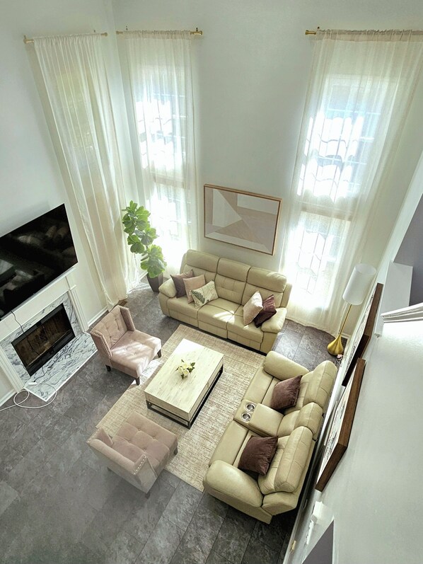 Smart TV, fireplace, books