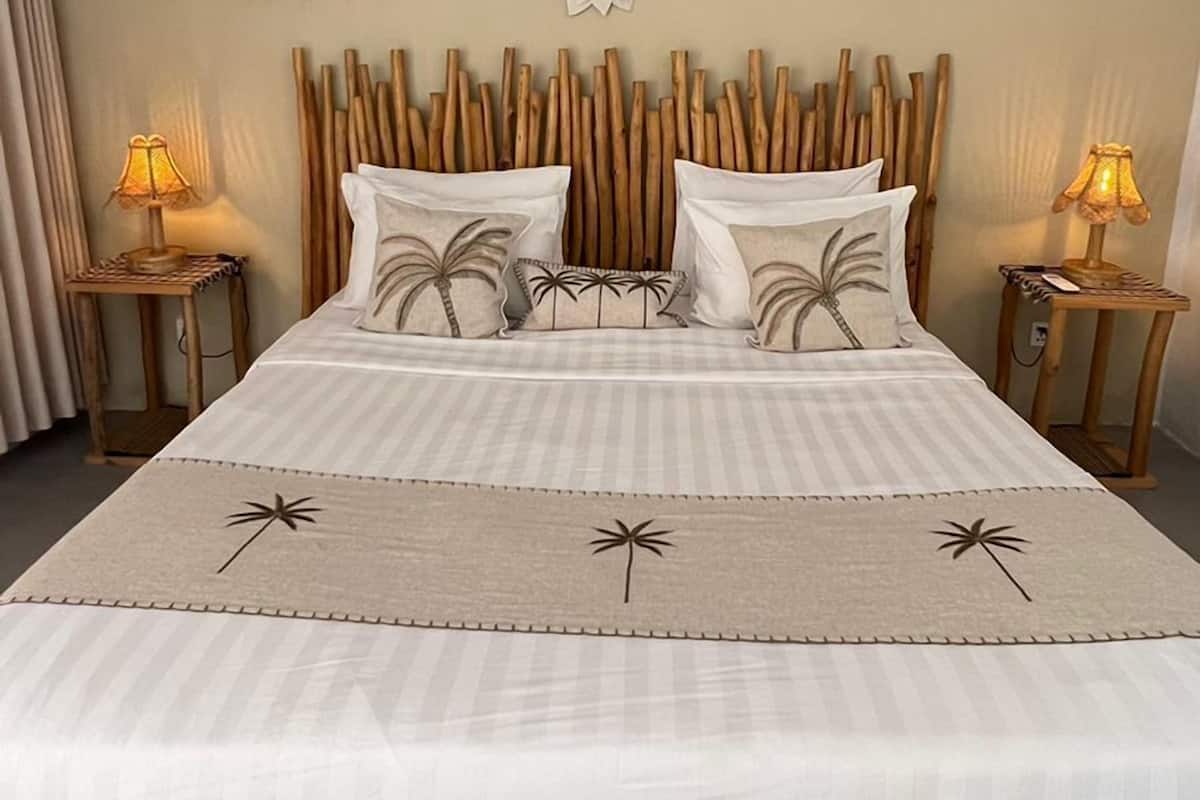 Deluxe Double Room, 1 Bedroom, Non Smoking, Pool View | 1 bedroom, in-room safe, free WiFi, bed sheets
