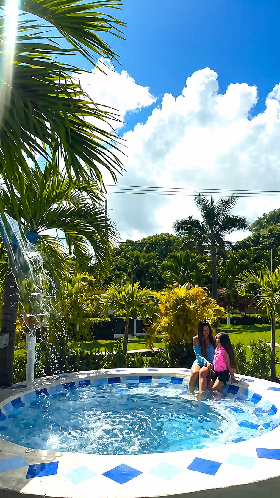 Outdoor pool, open 6:00 AM to 11:00 PM, pool umbrellas