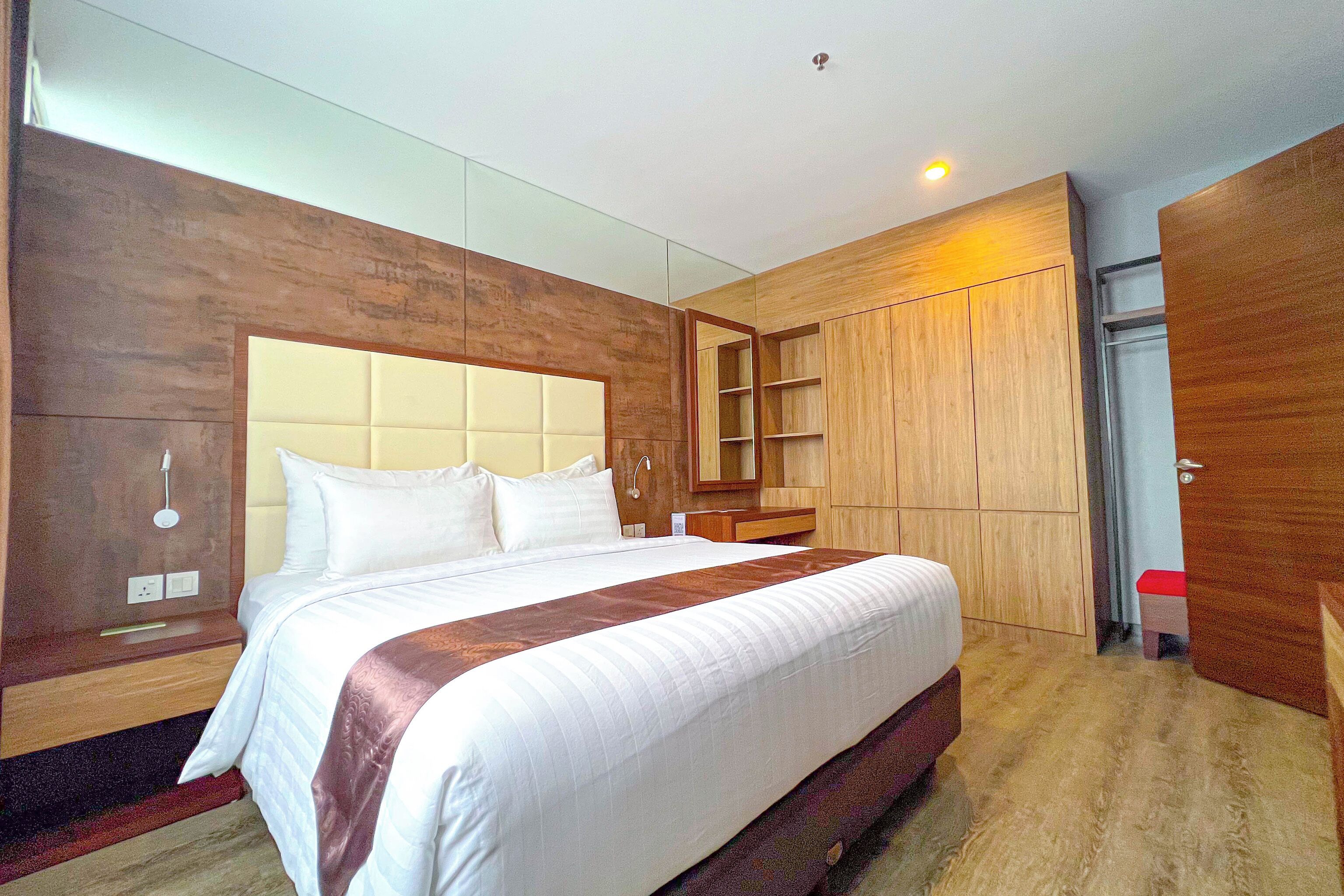 Suite exclusiva (Asialink Suite) | Minibar y caja de seguridad en la habitación 
