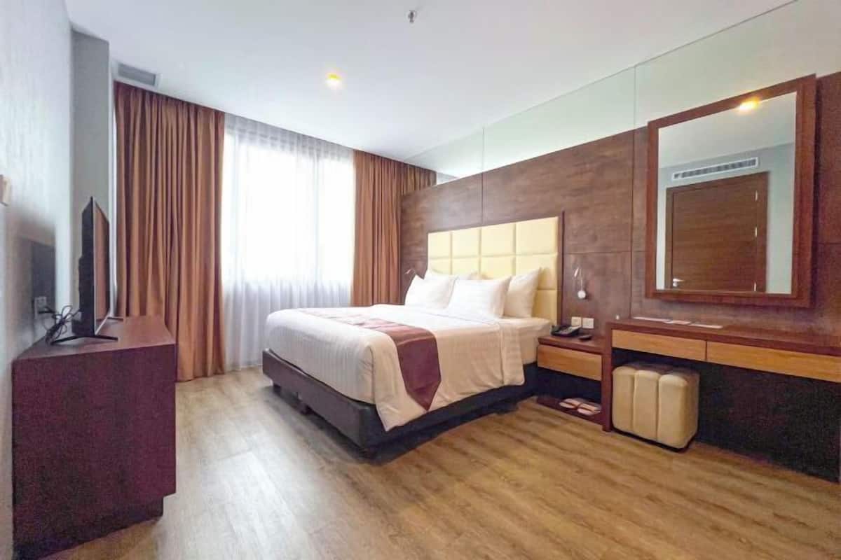 1 habitación, minibar y caja de seguridad en la habitación