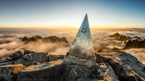 A mountain peak with a triangular monument at its summit. - Old Quarter View Hanoi Hostel (Hanoi)