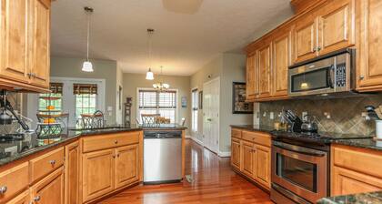 Beautiful 2 story brick home on a cul-de-sac. A beautiful pond in the back yard
