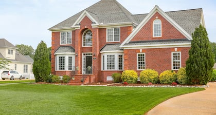 Beautiful 2 story brick home on a cul-de-sac. A beautiful pond in the back yard