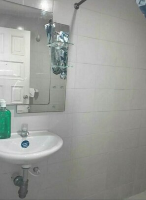 Shower, towels, soap, shampoo