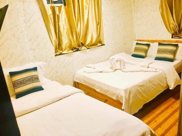 Desk, blackout curtains, iron/ironing board, bed sheets