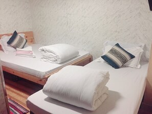 Desk, blackout curtains, iron/ironing board, bed sheets
