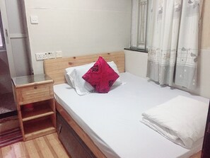 Desk, blackout curtains, iron/ironing board, bed sheets