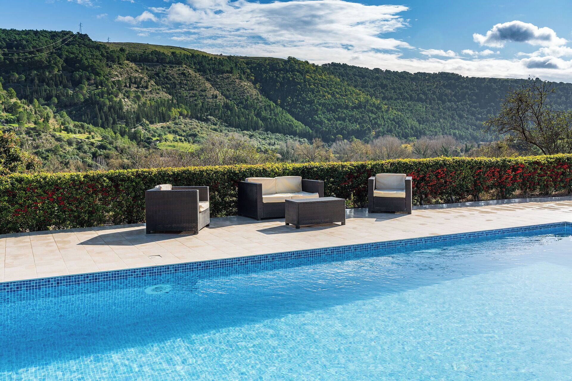 Private swimming pool and garden, both with a relaxing mountain view.