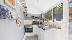 Cottage (2 Bedrooms) | Private kitchen | Cleaning supplies - Shell Cottage 2 Bedroom Holiday (Tenby)