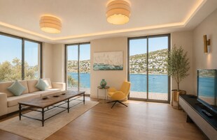 Una sala moderna con sofá, mesa de centro y sillón amarillo, ventanas amplias con vistas a un cuerpo de agua y edificios, y un cuadro en la pared.