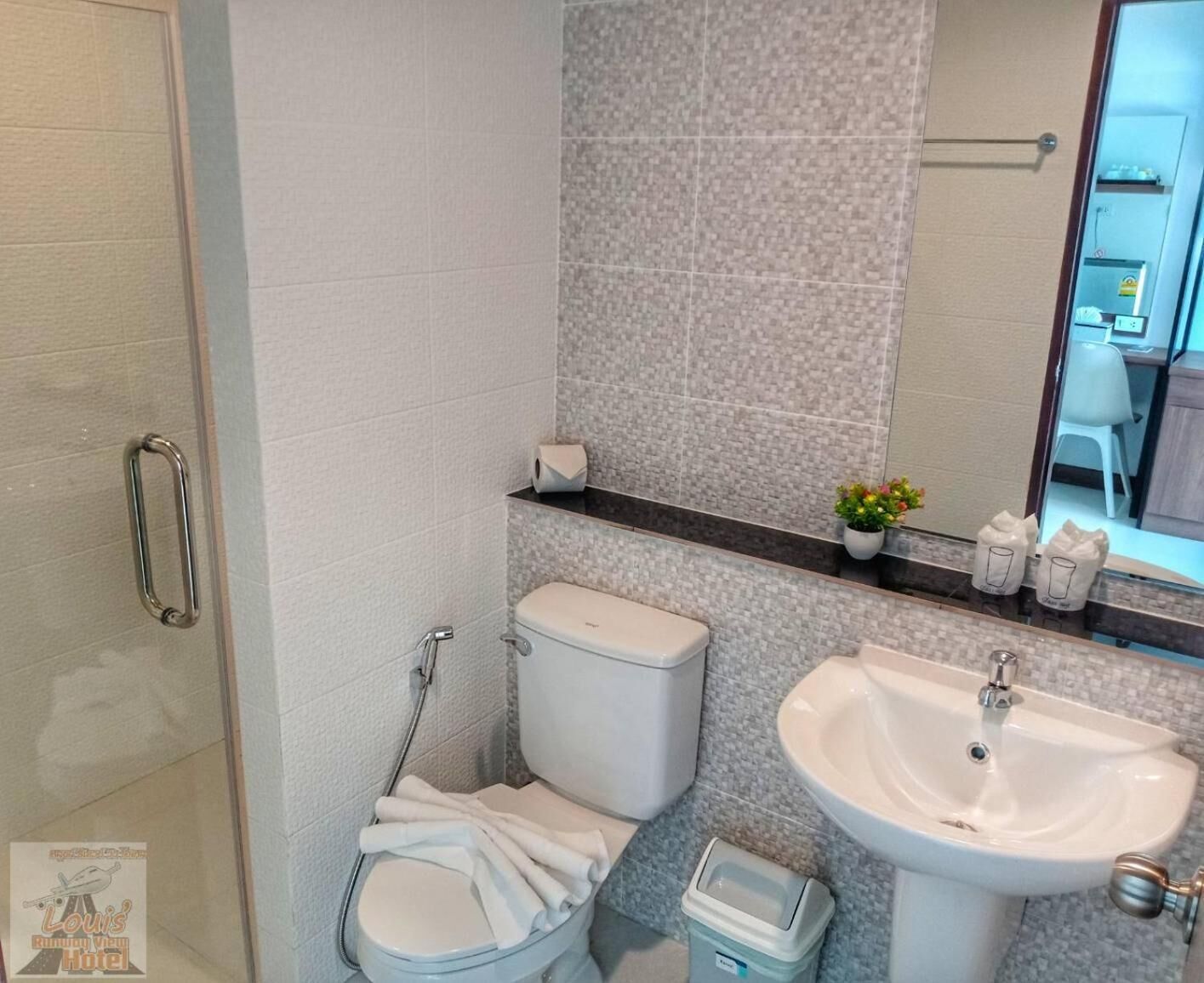 shower, rainfall showerhead, designer toiletries, hair dryer