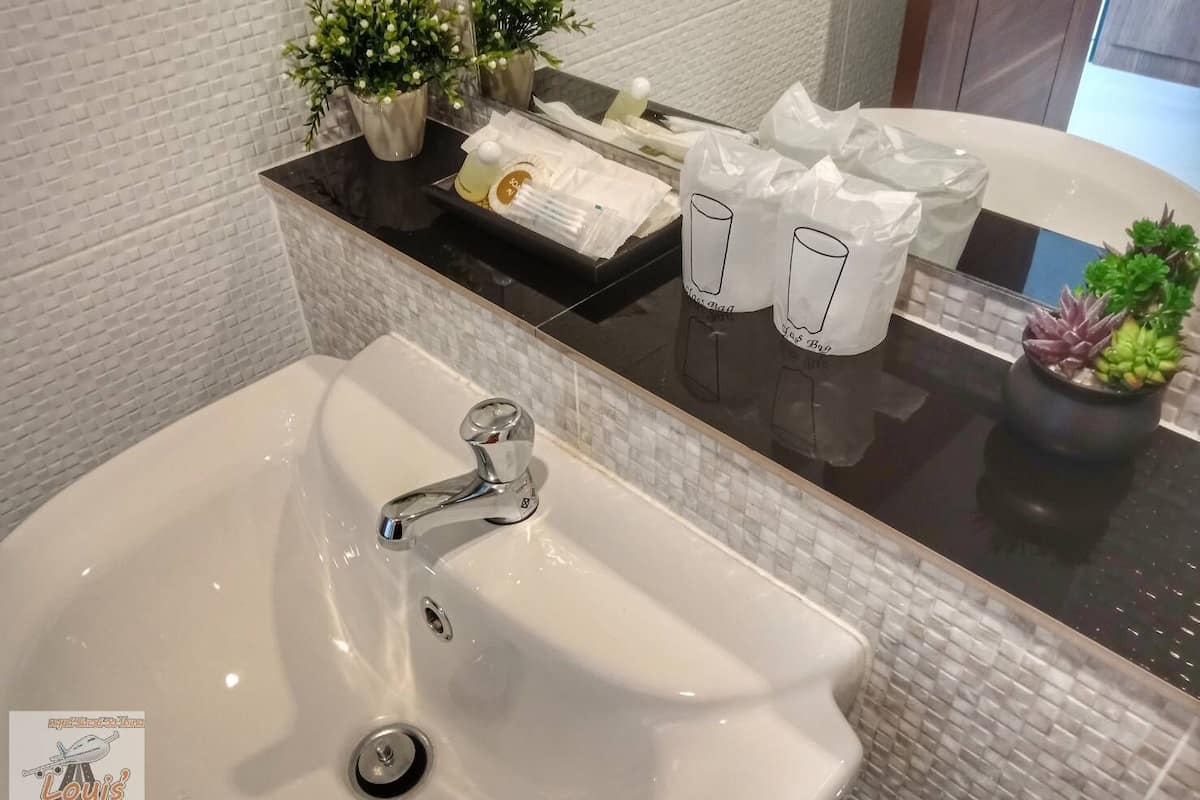 shower, rainfall showerhead, designer toiletries, hair dryer