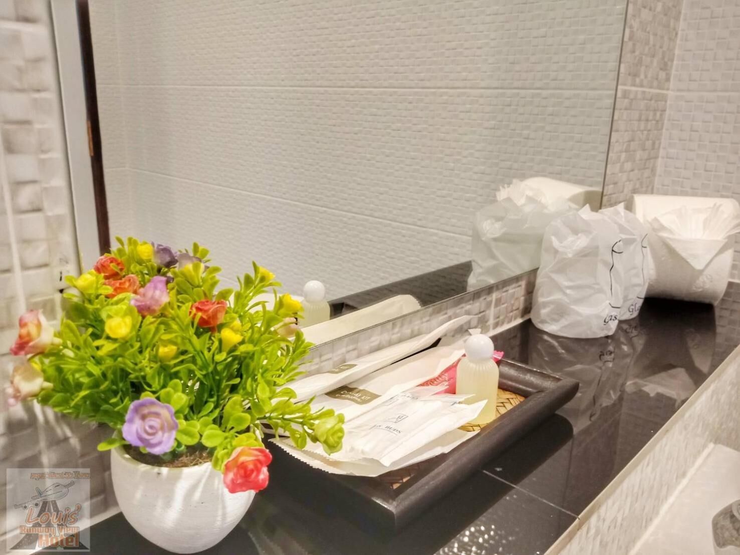 shower, rainfall showerhead, designer toiletries, hair dryer