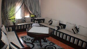 Apartment | Living area | Flat-screen TV - Sary's Hotel (M'diq)