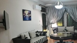 Apartment | Living room | Flat-screen TV - Sary's Hotel (M'diq)