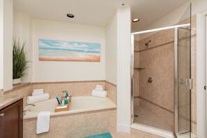Combined shower/tub, hair dryer, towels, soap