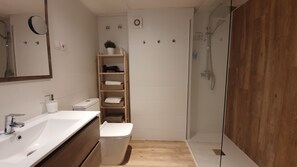 Shower, hair dryer, towels, soap