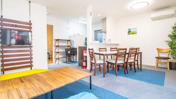 AMP FLAT Itoshima | Living area | Flat-screen TV