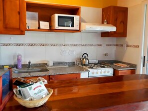 Family Apartment, 2 Bedrooms, 2 Bathrooms, Courtyard Area | Private kitchen - Apartamentos Barranca de Termas (San José)