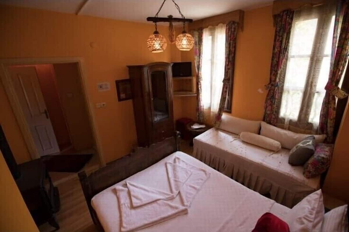 Family Deluxe Room with Fireplace | Beddengoed