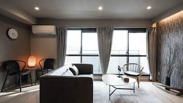 Appartement Exécutif, 1 chambre, non-fumeur, vue ville | Coin séjour