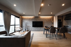 Executive Apartment, 1 Bedroom, Non Smoking, City View | Living area | Flat-screen TV