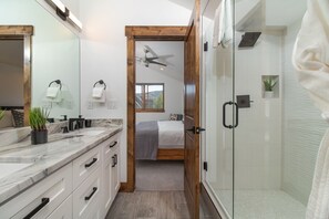 Combined shower/tub, hair dryer, towels, soap