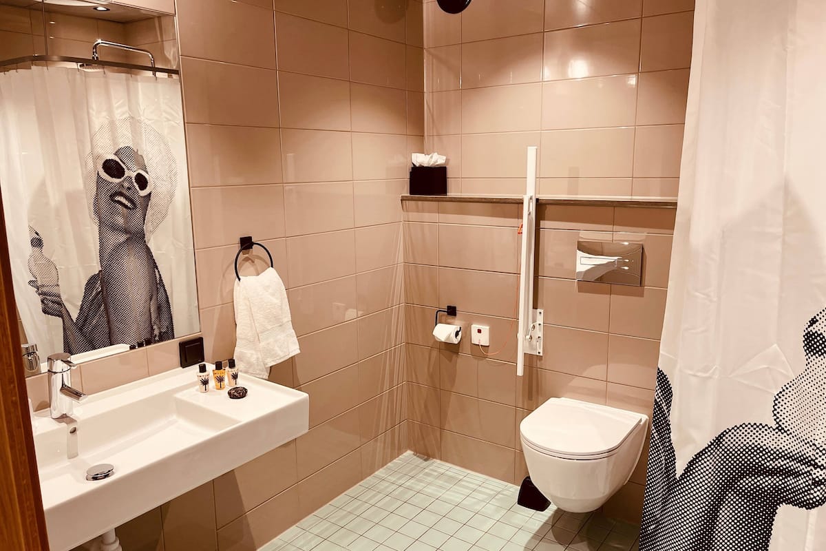 family quadruple room | bathroom | free toiletries, hair dryer, towels, soap