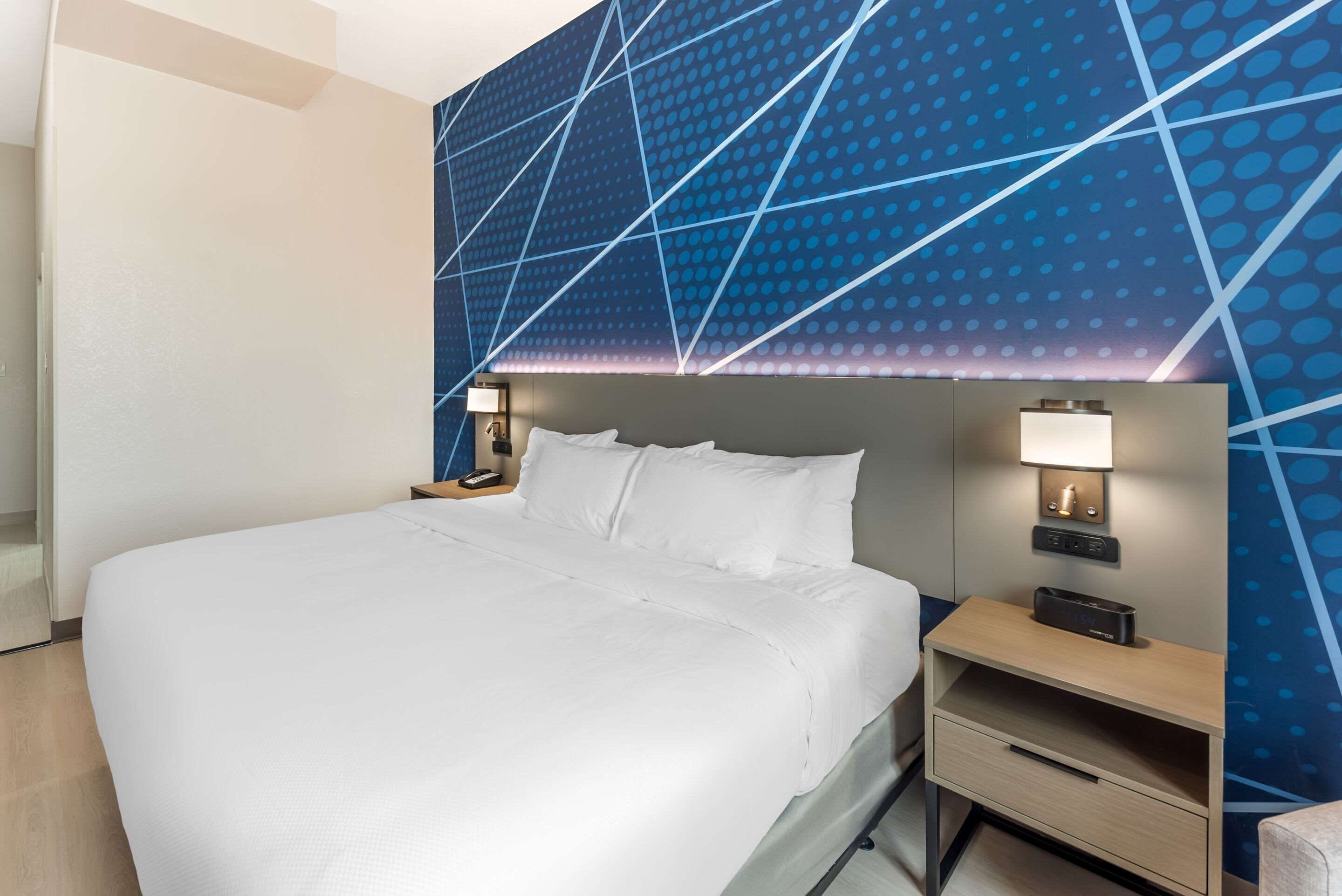 desk, laptop workspace, blackout curtains, iron/ironing board