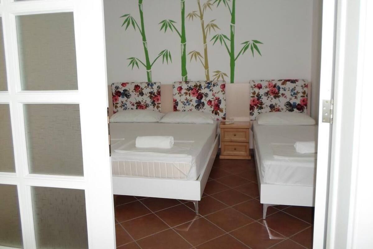 Standard Apartment, 2 Bedrooms | Minibar, cribs (free), WiFi (free), bed sheets