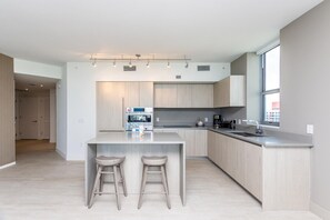 Two Bedroom Apartment with Intercostal and City View | Premium bedding, in-room safe, individually decorated