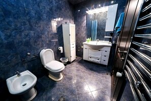 Combined shower/tub, hair dryer, towels, soap