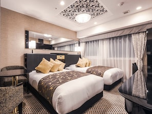 Tvåbäddsrum Deluxe - tillgänglighetsanpassat - icke-rökare | Duntäcken, skrivbord, mörkläggningsgardiner och gratis wi-fi