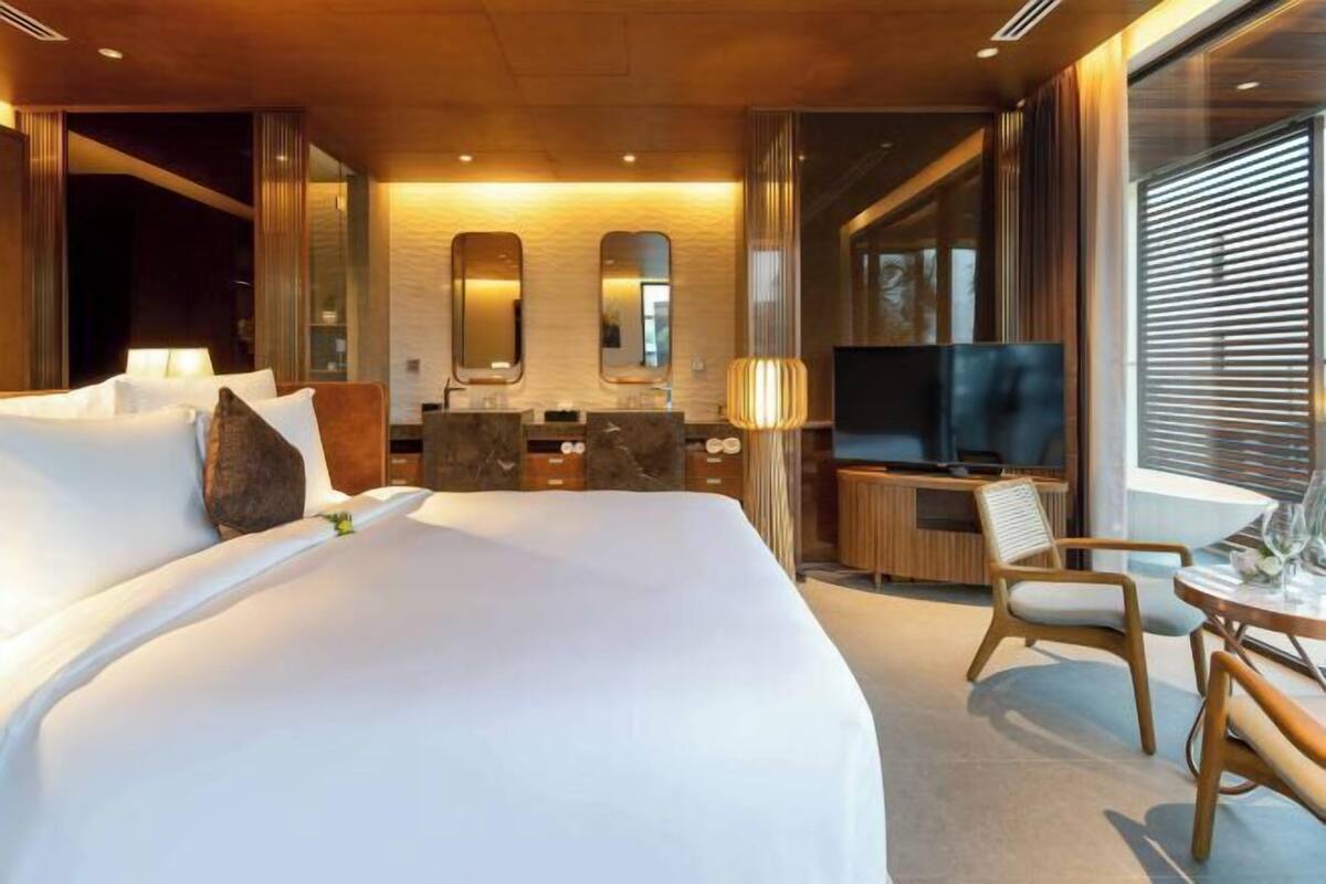Premium bedding, down comforters, pillowtop beds, in-room safe