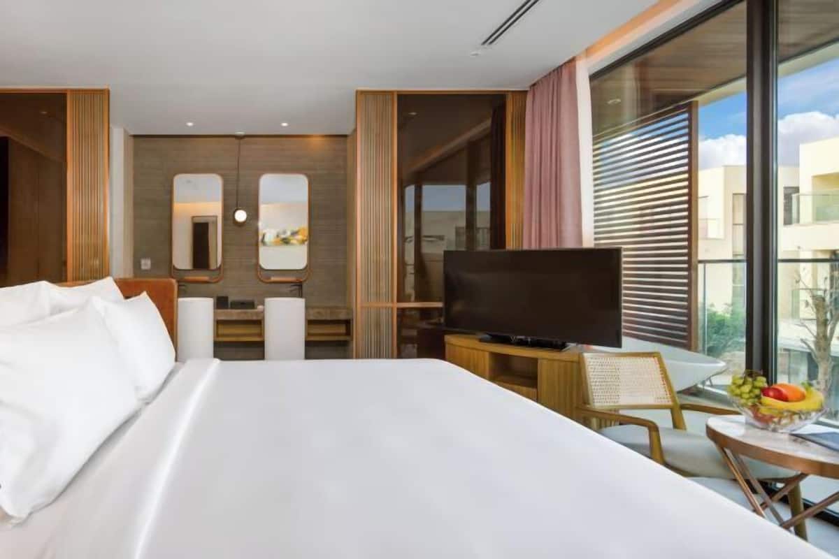 Premium bedding, down comforters, pillowtop beds, in-room safe