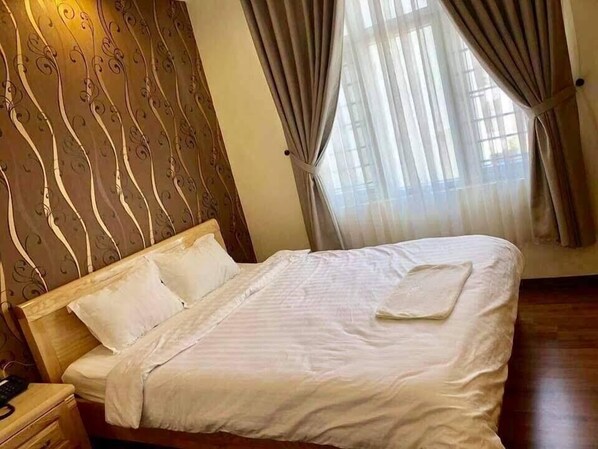 Blackout drapes, soundproofing, iron/ironing board, bed sheets