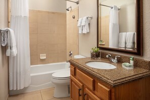 Combined shower/bathtub, hair dryer, towels, soap
