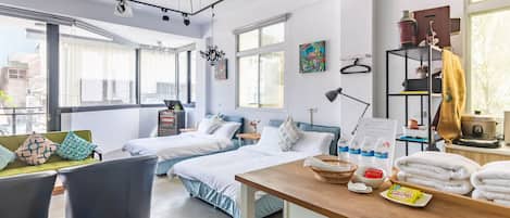 Deluxe Quadruple Room, Balcony (with private bathroom outside room) | Desk, blackout drapes, soundproofing, free WiFi