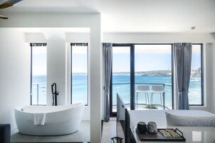 Premium bedding, down duvets, pillow-top beds, free minibar