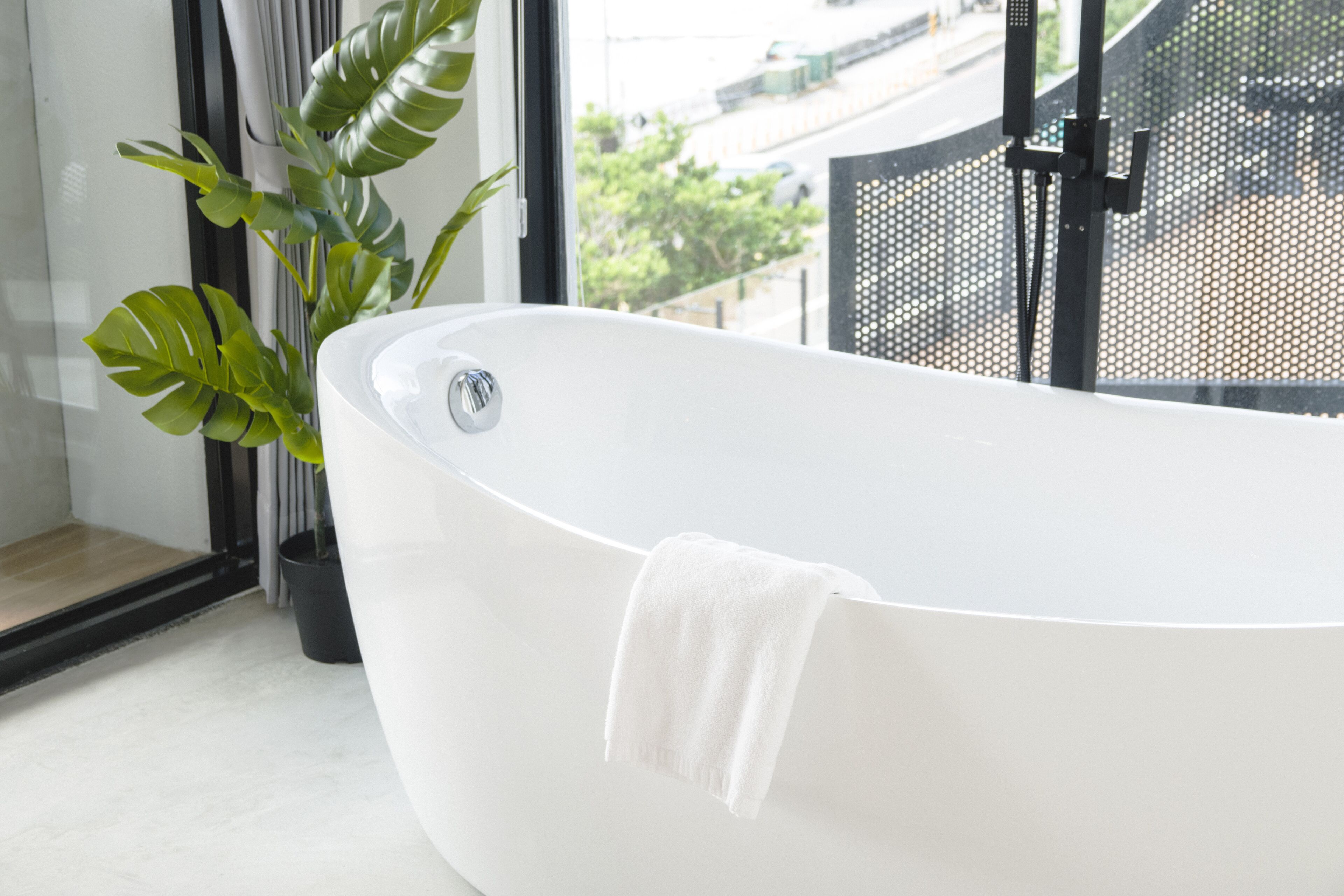 grand double room, 1 queen bed, terrace, ocean view | deep-soaking bathtub