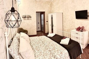 2 quartos, ferros/tábuas de passar roupa, Wi-Fi, roupa de cama