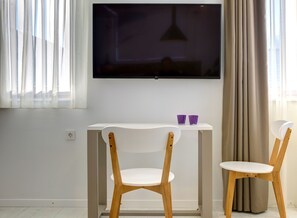 Deluxe Double or Twin Room, City View | Television