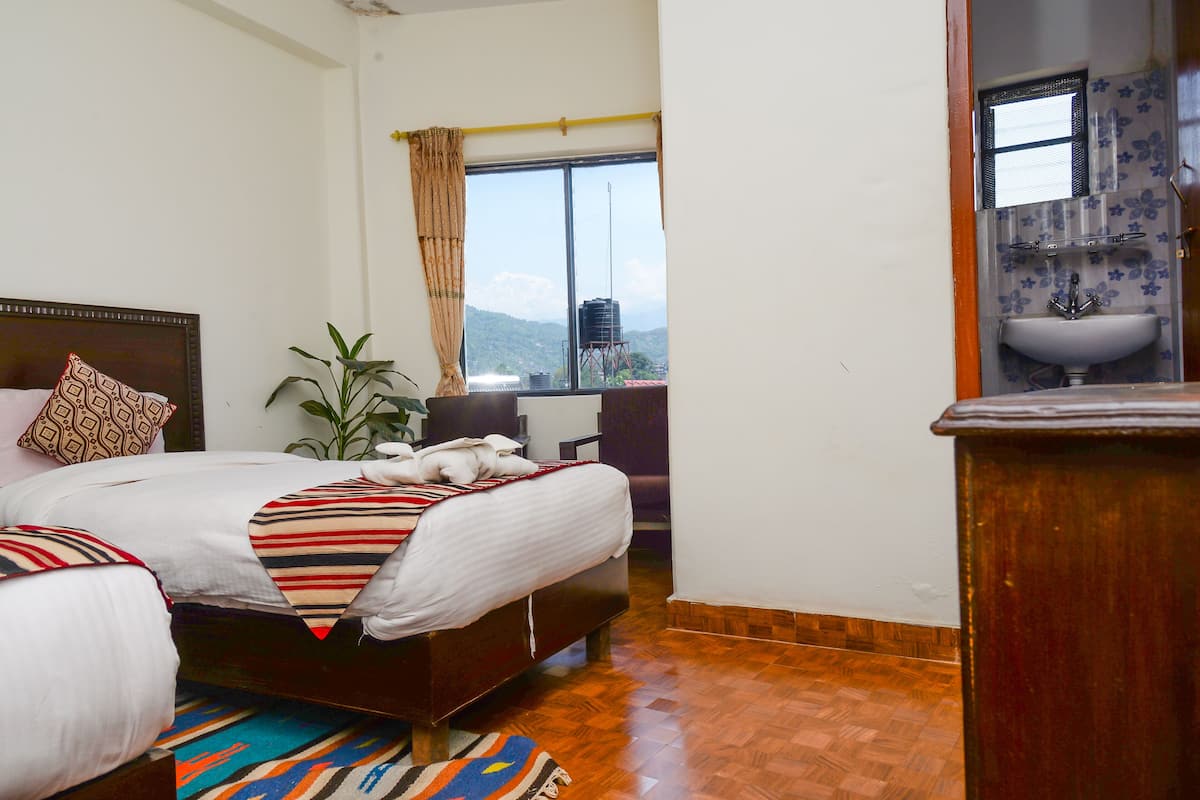 Habitación Deluxe con 1 cama matrimonial o 2 individuales | Sábanas de algodón egipcio, ropa de cama de alta calidad y edredón